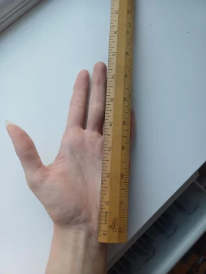 Hand being measured.webp